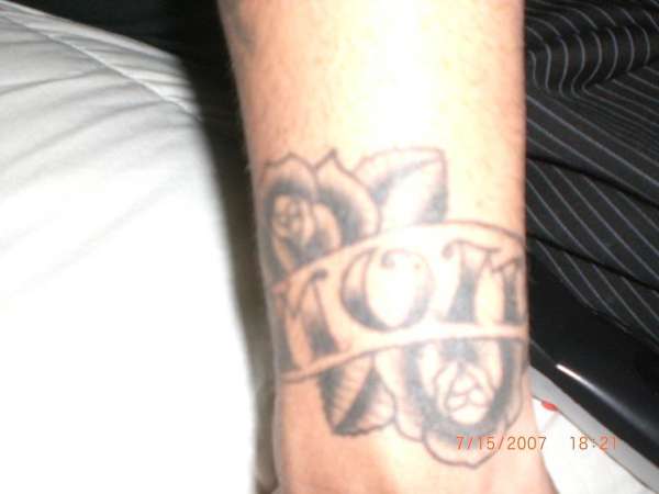 mom with roses tattoo