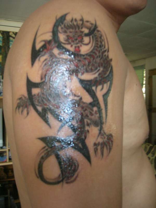 dragon w/ tribal tattoo