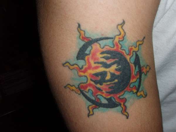 Tribal Sun tattoo