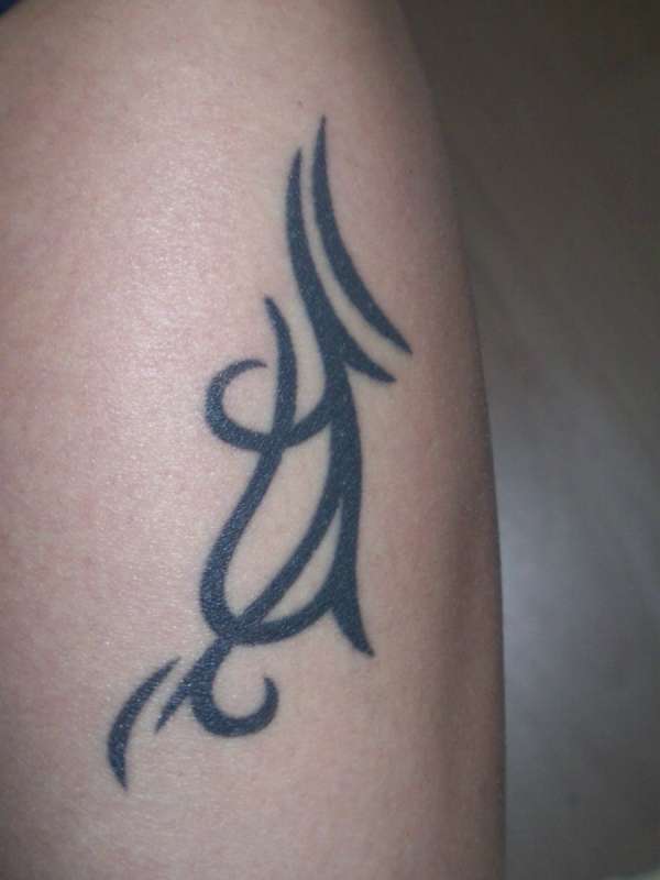 tribal on my right calf tattoo