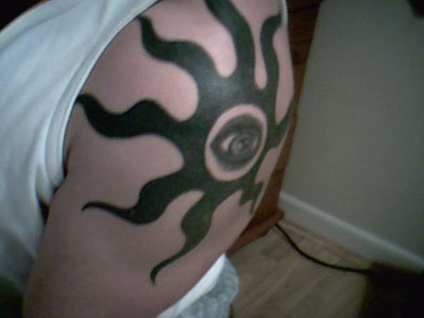 TRIBAL SUN WITH EYE tattoo