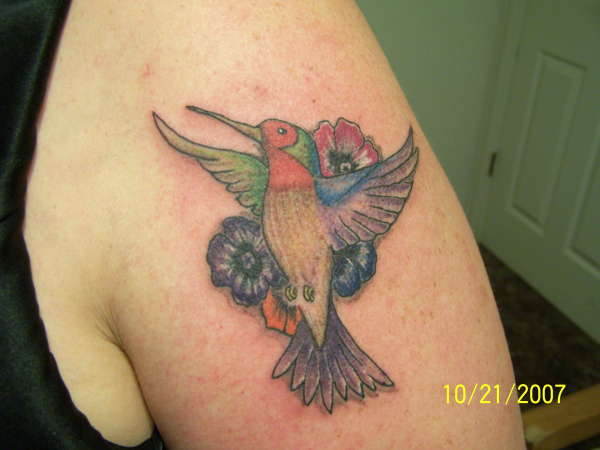 Humming bird tattoo