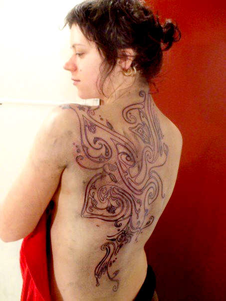 maori influenced art nouveau tattoo