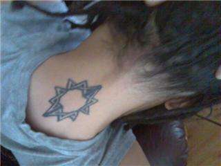 Star on Back of Neck tattoo
