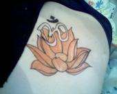 lotus with an om tattoo