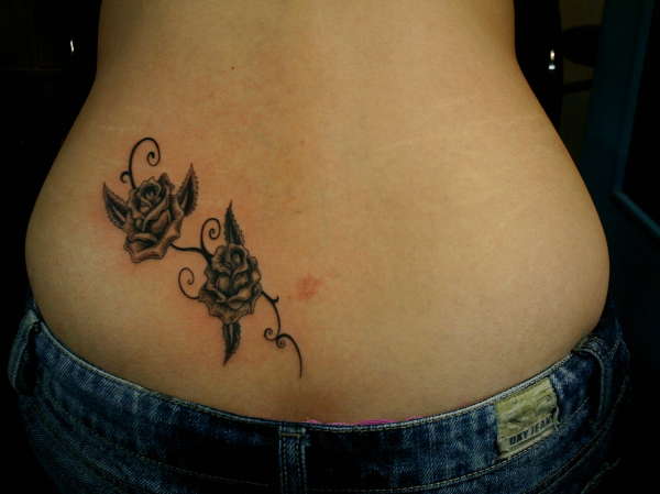 st.angel78...(lower back tatz ..rose...) tattoo
