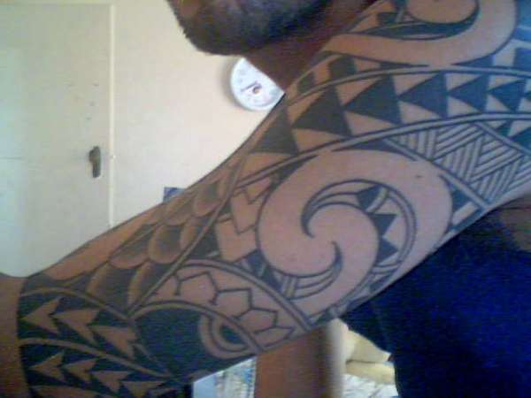 tribal twist tattoo