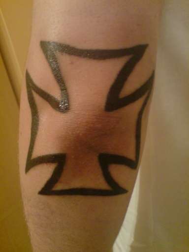 iron cross tattoo elbow