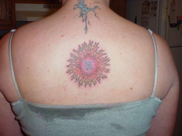 ZODIAC FIRE SUN THANG tattoo