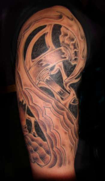 bio mechanical/abstract half sleeve tattoo