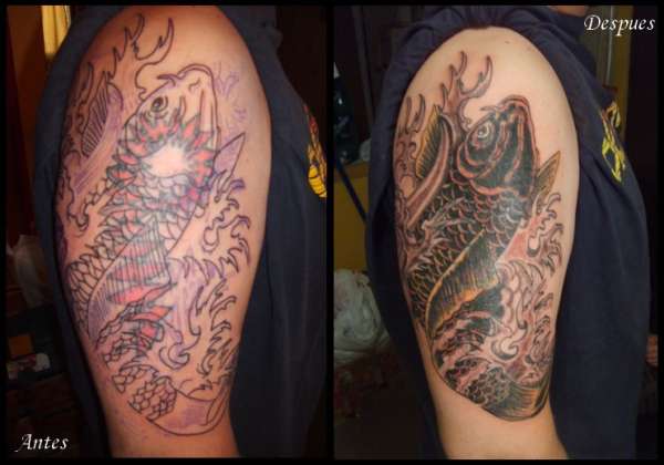 Black koi cover up tattoo