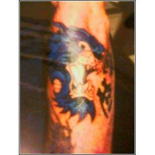 panther over mess tattoo