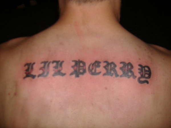 name on back tattoo