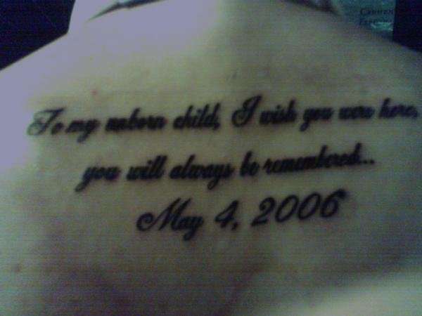 back tat tattoo