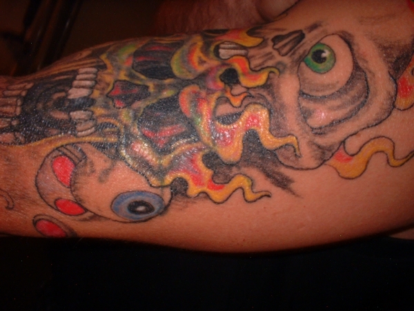 skulls/flames tattoo