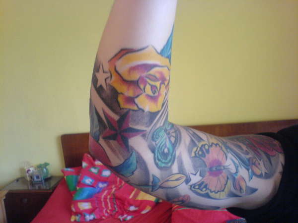 Roses Stars Butterflies tattoo