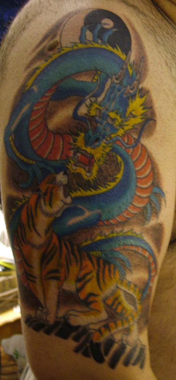 Tiger and Dragon existing in peace tattoo
