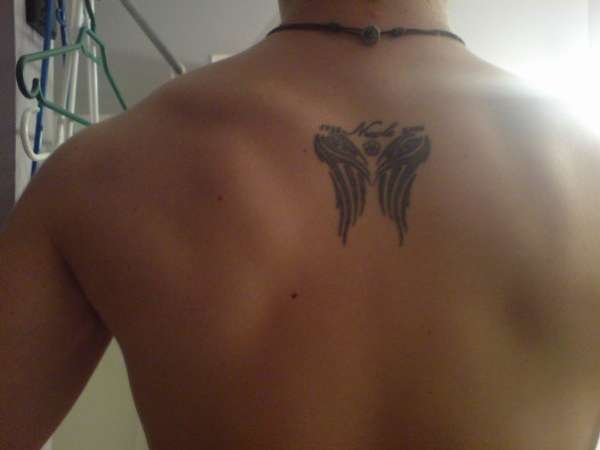 tribal wings tattoo