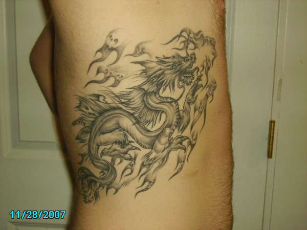DRAGON AND SKULLS FINISHED tattoo