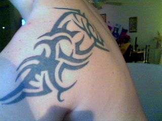 random tribal piece tattoo