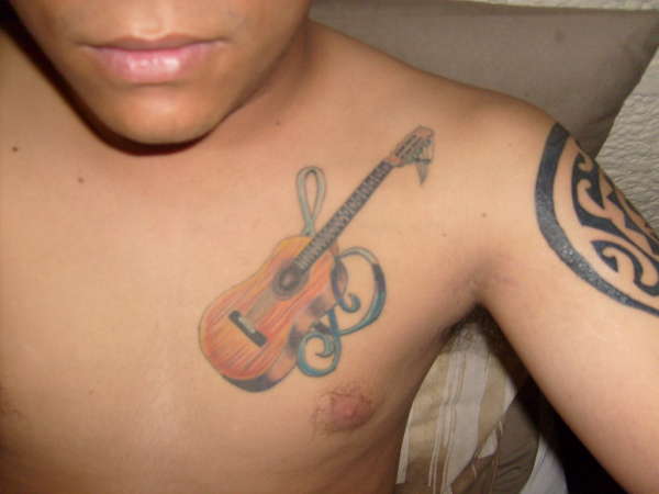 treble clef guitar tattoo