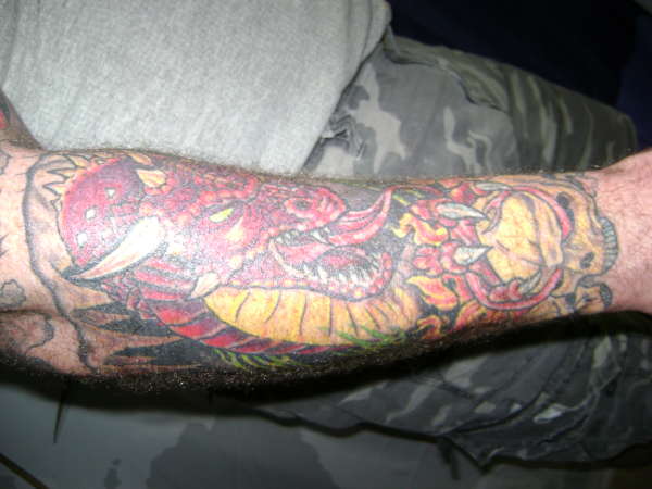 dragon & skulls tattoo