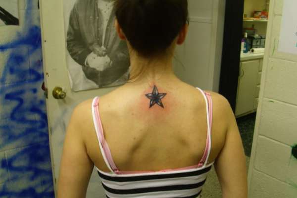 Blue nautical star tattoo