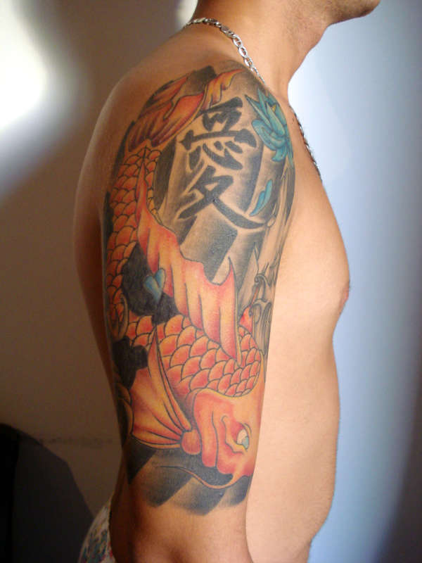 Koi with blue Lotus tattoo