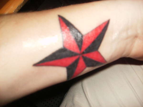 star tat on wrist tattoo