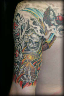 grim reaper/clown tattoo