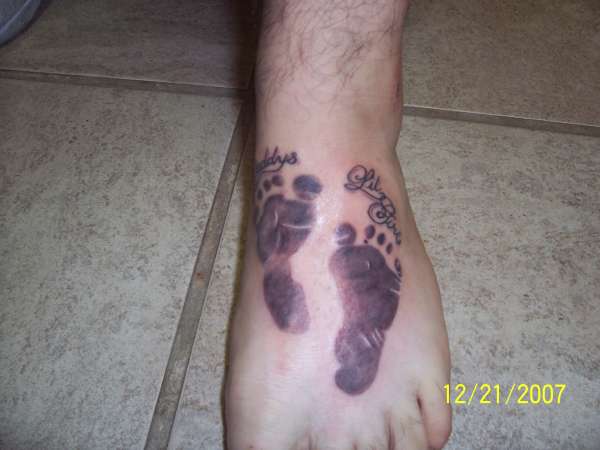 footprints tattoo