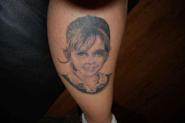 my daughter's portrait tattoo