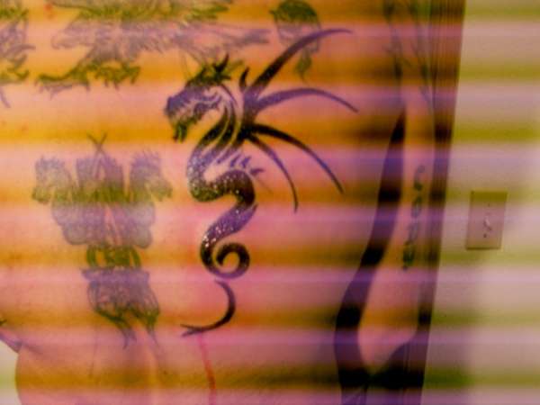 Tribal Dragon tattoo