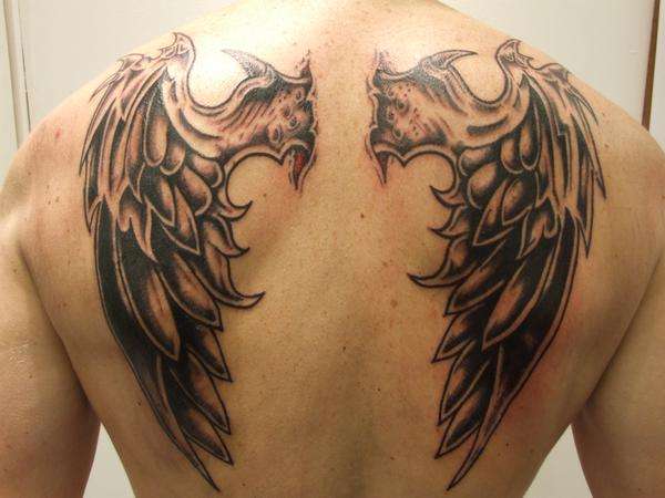 Reis naakt vroegrijp demon wings tattoo