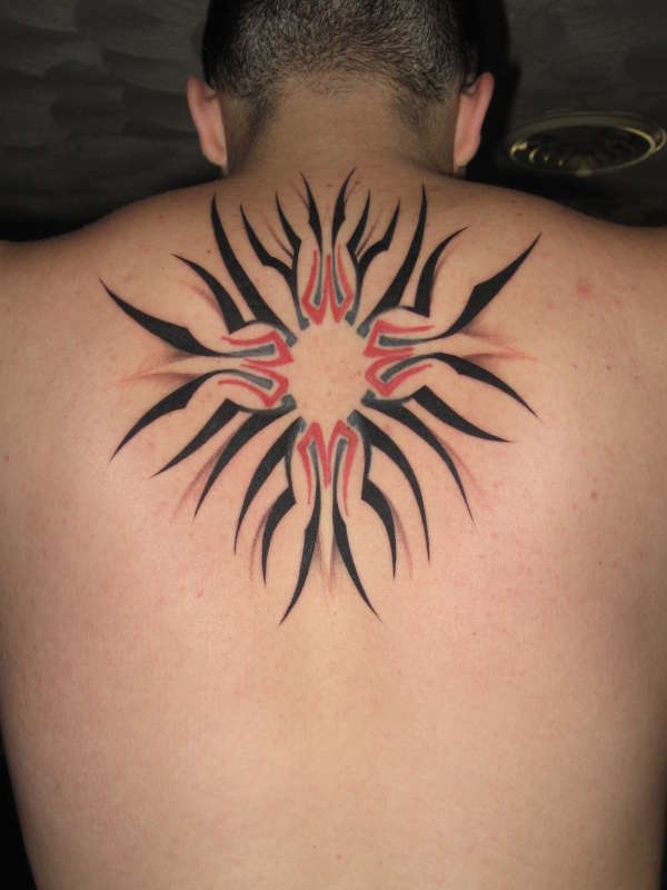 tribal star coverup tattoo