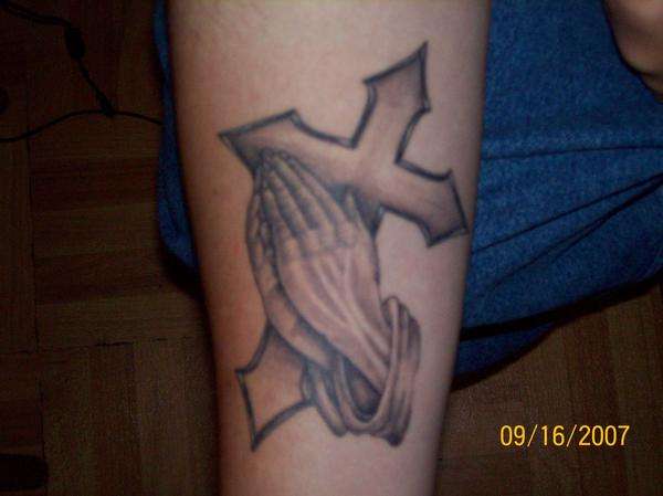 praying hands tattoo