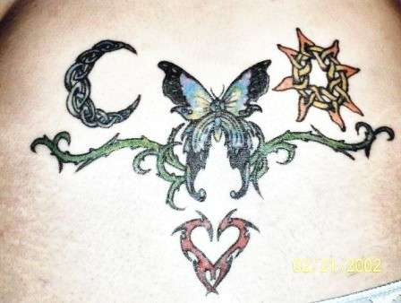 Celtic butterfly, sun, moon, and heart. tattoo