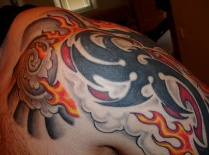 Dragon with flames, jap styling (close up) tattoo