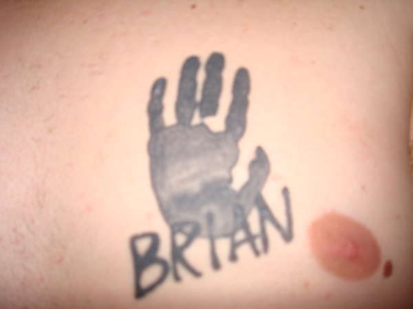 Son's Hand and Name tattoo