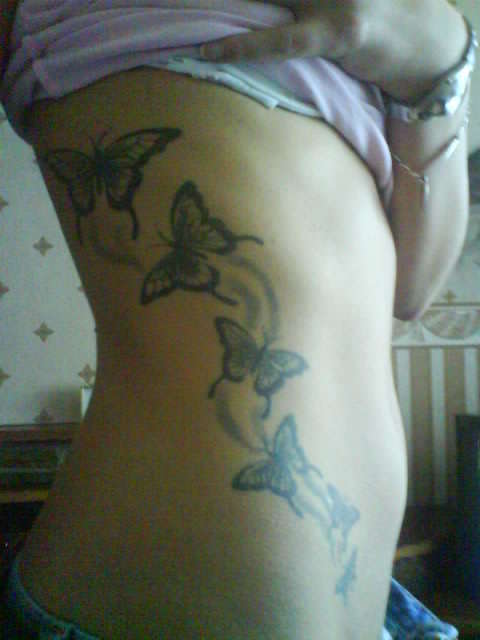 Butterflies, all healed tattoo