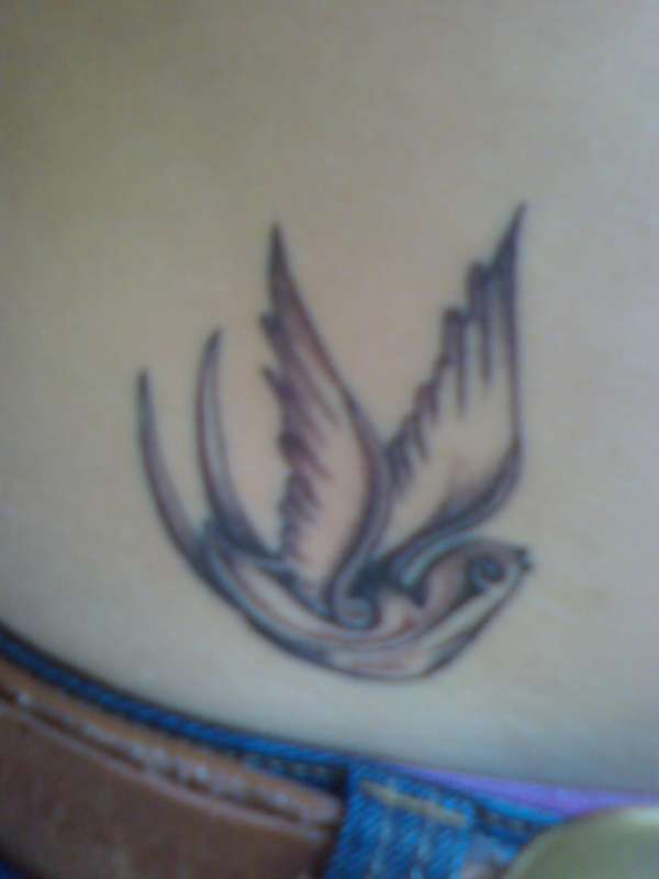 A Swallow on Hip tattoo