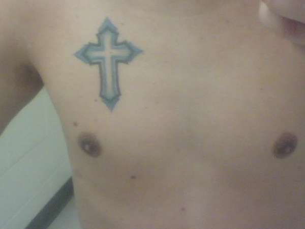 cross over chest tattoo