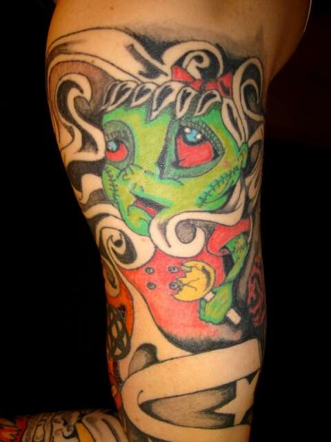 girl i designed in top part of arm tattoo