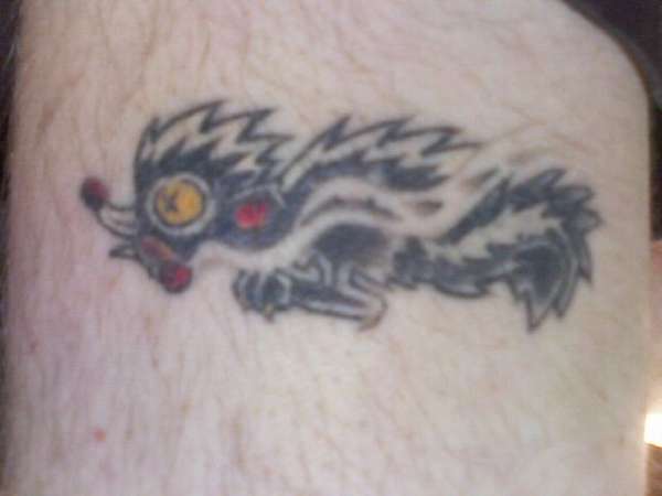 Skunk smokin a blunt tattoo