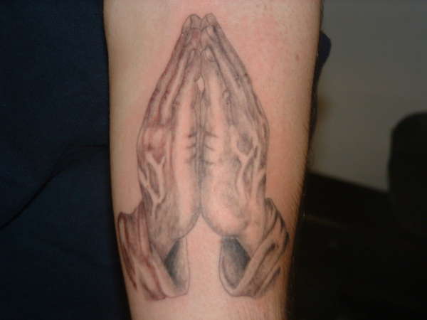 praying hands tattoo