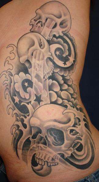 Skull Rib Piece tattoo
