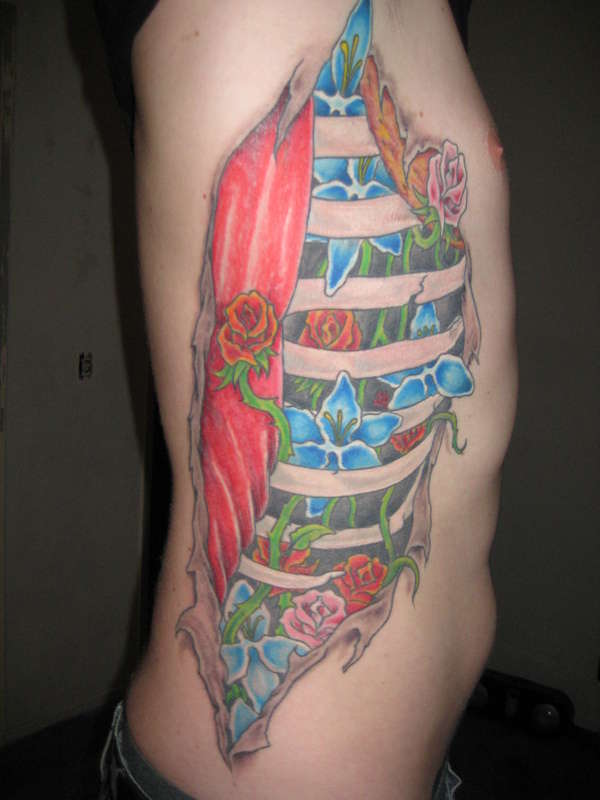 completed ribs tattoo