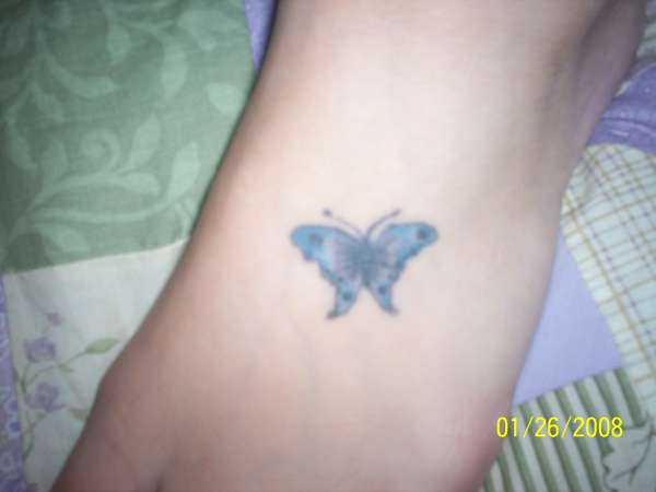 butterfly on my left foot tattoo