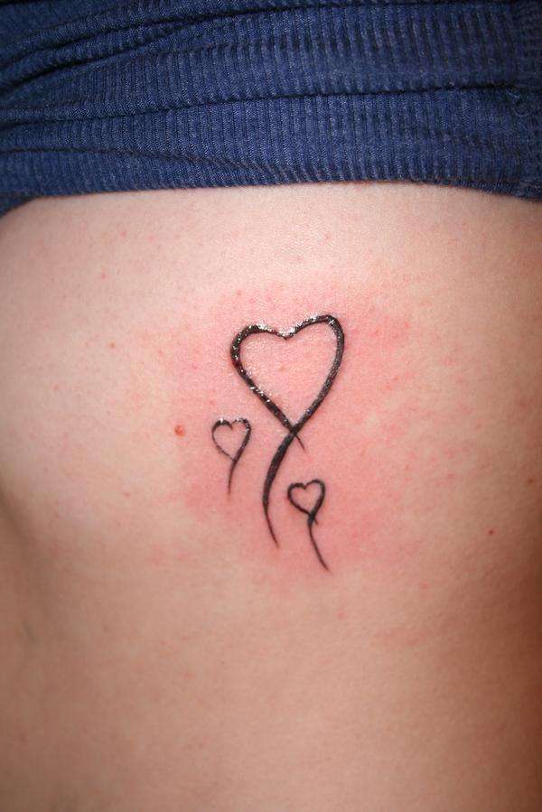 Ashley's Hearts tattoo