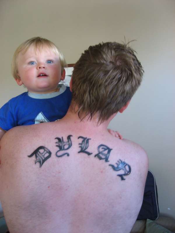 My son on my back tattoo